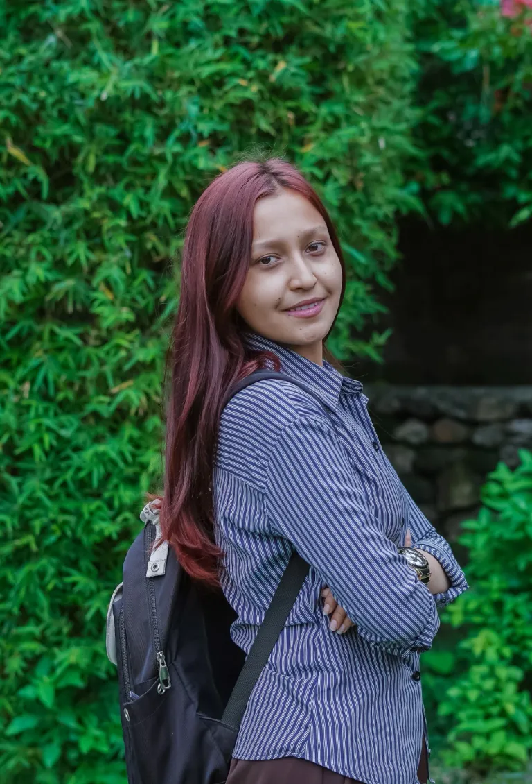 A girl carrying a bag